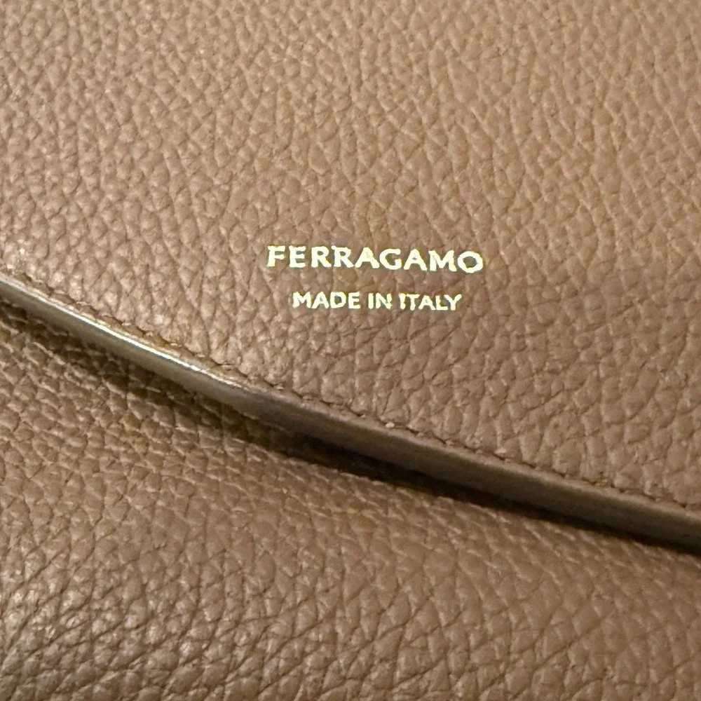 Salvatore Ferragamo Fiamma‎ Crossbody Bag in tan pebbled leather